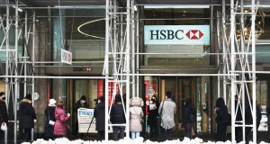 HSBC Froze Hong Kong Activist Accounts in 2020 HSBC bank building exterior with Hong Kong skyline in background, symbolizing corporate compliance controversy